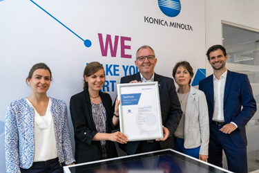 internal carbon offsetting at Konica Minolta